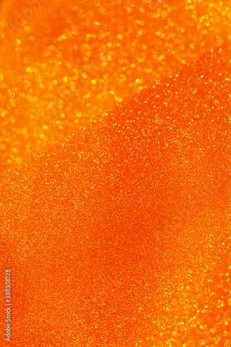 Orange glitter bokeh circle glow blurred and blur abstract. Glittering shimmer bright luxury . White and silver glisten twinkle for texture wallpaper and background backdrop. 