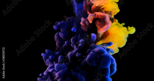 Color drops in water , abstract color mix , drop of Ink color mix paint falling on background,