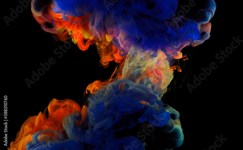 Color drops in water   abstract color mix   drop of Ink color mix paint falling on background 