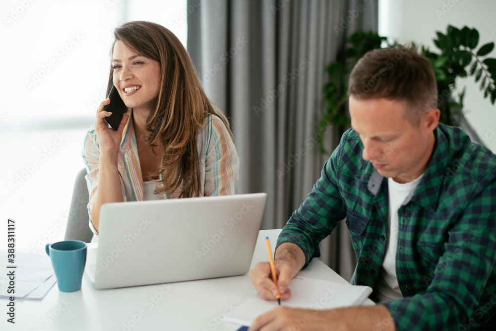 Husband and wife preparing bills to pay. Young couple having financial problems... Husband and wife preparing bills to pay. Young couple having financial problems...