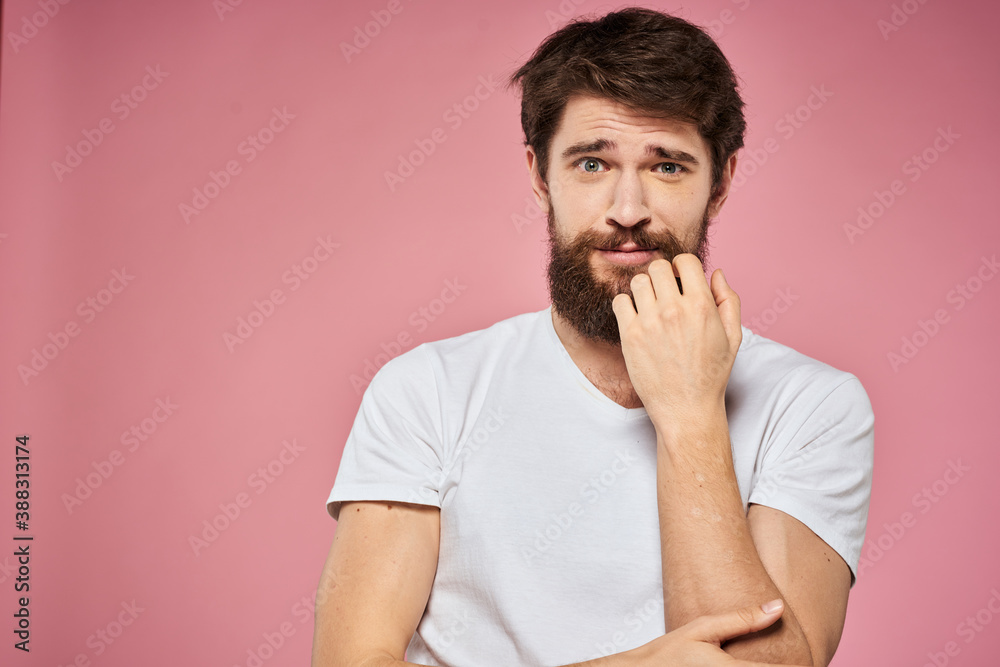 man in white t-shirt gesturing with his hands emotions fun pink background man in white t-shirt gesturing with his hands emotions fun pink background