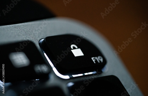 Close up of Keyboard key on space grey metal. High quality photo. Cyber security and safety photo