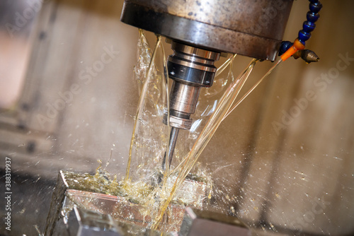 Konstfotografi The CNC milling machine cutting the  mold parts with oil coolant method
