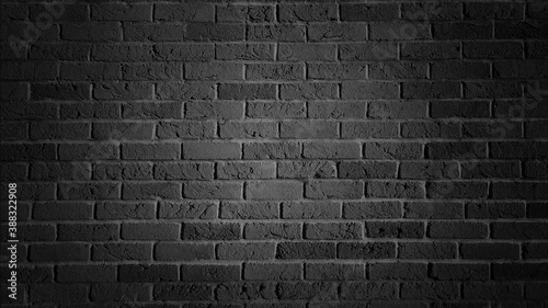 Black Painted Brick Wall Texture Abstract Background or Wallpaper Template with Spotlight Light Effect Vignette