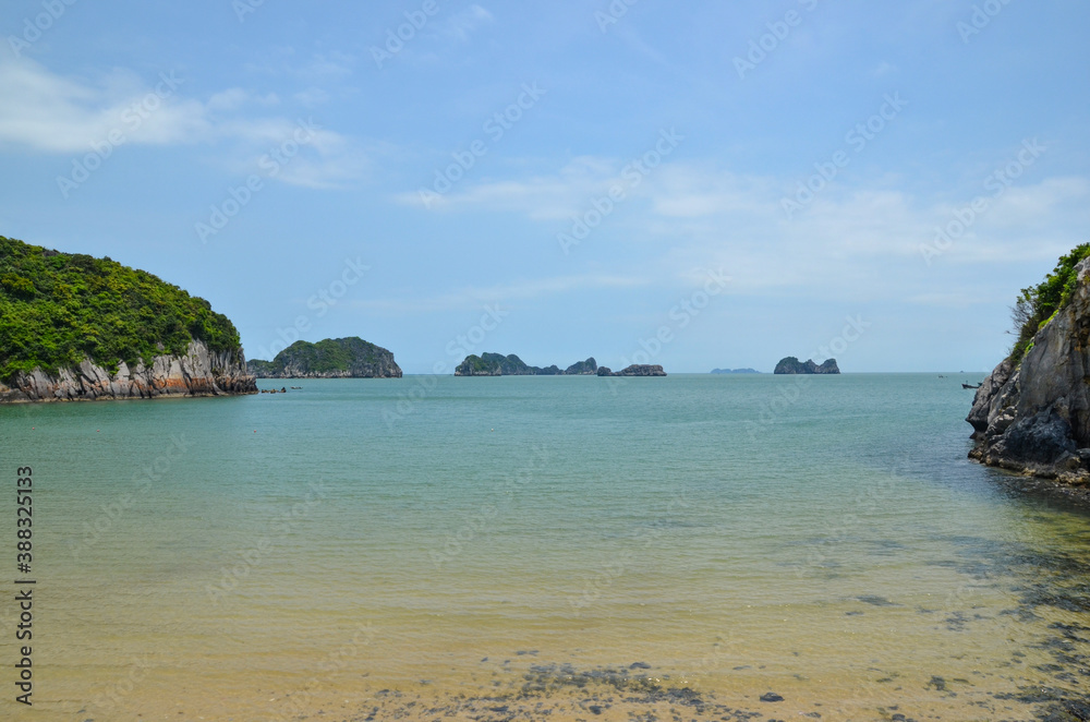 Sunny day View of Halong Bay from the beach.