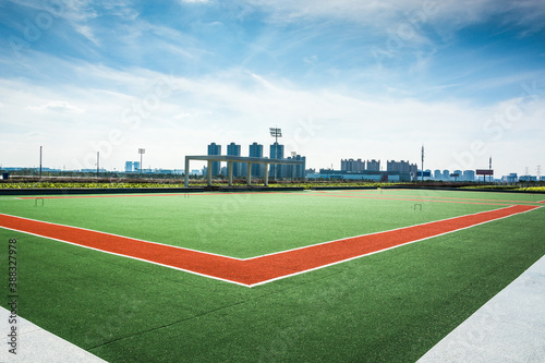 Panoramic view of soccer field stadium and stadium seats photo