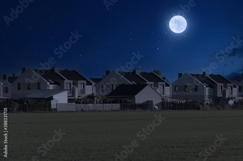 Canvastavla Modern housing estate on a moonlit night