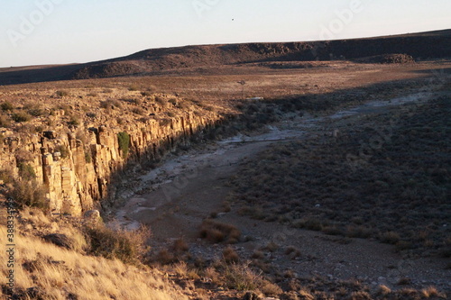 dry riverbed in the karoo at sunset