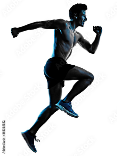 one caucasian young man exercIsing fitness exercise in studio shadow silhouette isolated on white background