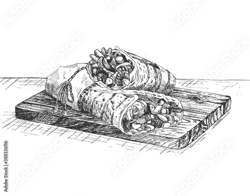 burrito on a wooden board tray