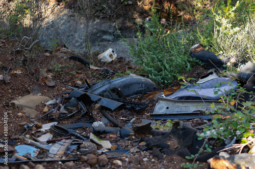 Pile of garbage on green grass in nature environmental problems. Nature disaster concept