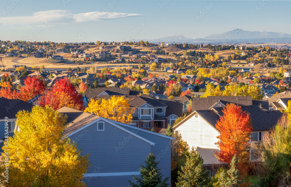 Colorado Living. Centennial, Colorado - Denver Metro Area Residential Autumn Panorama with the view of a Front Range mountains in the distance