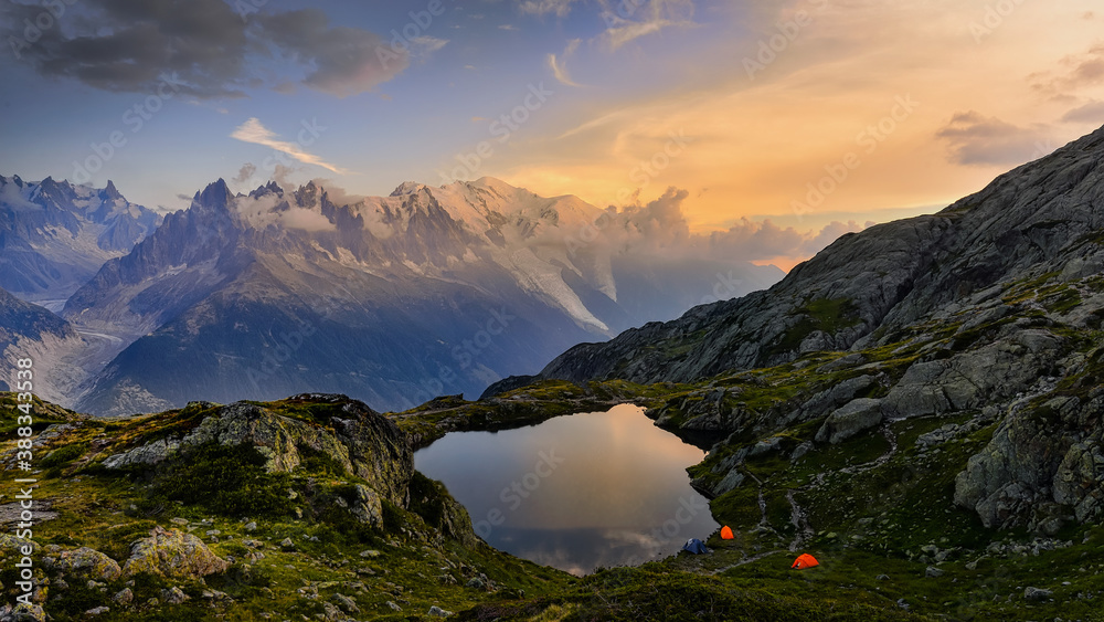 beautiful sunset by the lake under the snowy Mont Blanc