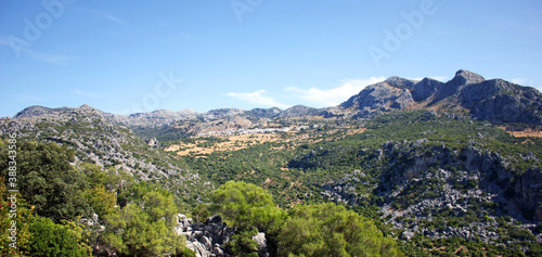 Paisaje del Parque Natural Sierra de Grazalema con el pueblo de Benaocaz al fondo, provincia de Cádiz Andalucía España photo