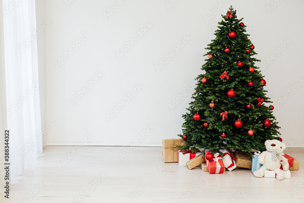 Christmas tree with gift decor for the New Year 2022 holiday winter place for inscription