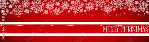 Merry Christmas background panorama template greeting card - White ice crystals and snowflakes and banner isolated on abstract red texture, with space for text