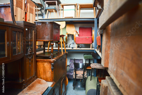 Vintage furniture shop. Second hand furniture market. Retro furniture for sale. Antique vintage store. 