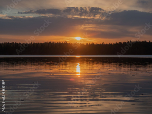 Sunset view on a clam lake in Karelia, northwest of Russia
