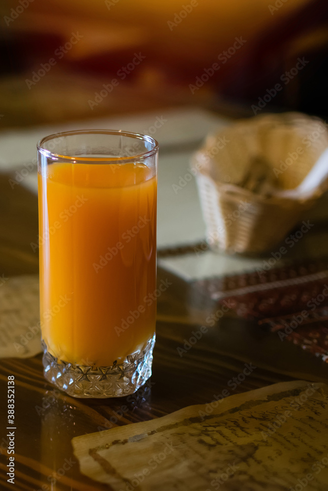 Fresh Orange Juice On Wooden Table In Cafe Fresh Orange Juice On Wooden Table In Cafe