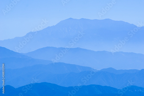 Blue mountains backdrop in tiered tones of blue