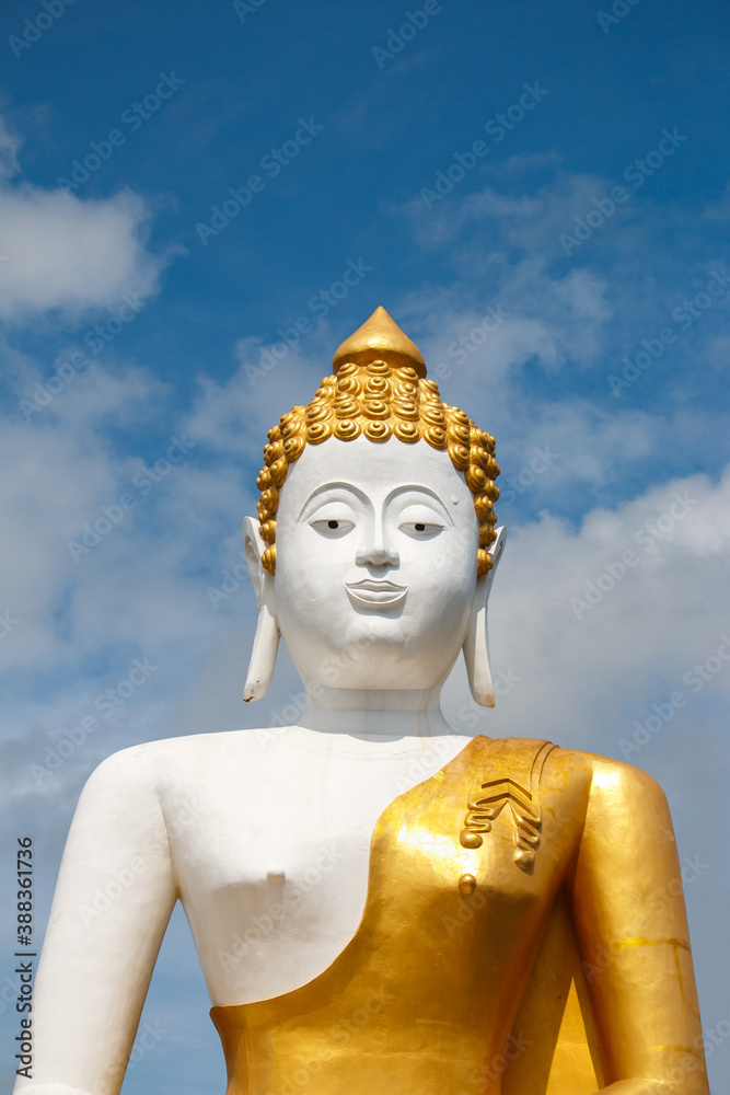 Big buddha in Wat Phra That Doi Kham (Temple of the Golden Mountain)