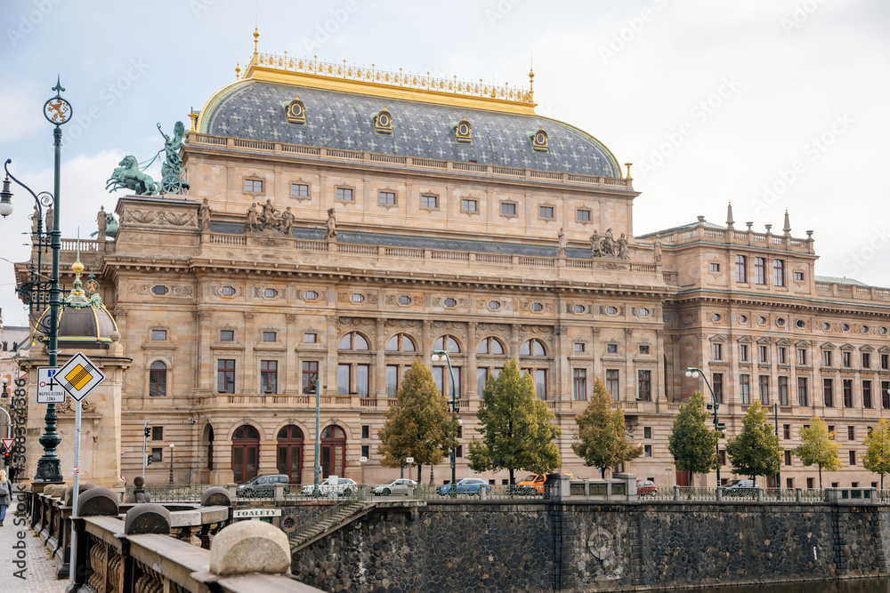 Beautiful Renaissance building of Prague National Theatre, view from the Vltava river in autumn, Prague, Czech Republic, Bohemia region