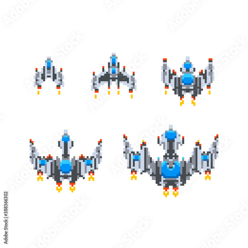 Set of level up of cute little spaceships, vintage game hero in pixel art style on white