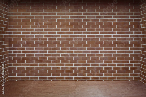 empty room with red brick wall and wooden floor.