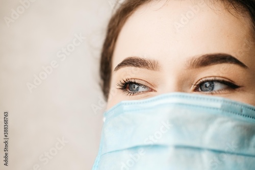 Woman wearing an anti virus protection mask to prevent others from corona COVID-19 and SARS cov 2 infection