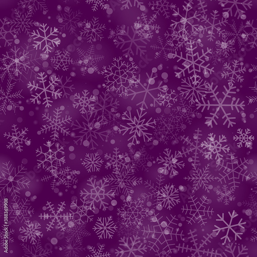 Christmas seamless pattern of snowflakes of different shapes, sizes and transparency, on purple background