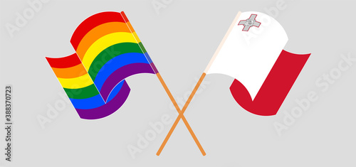 Crossed and waving flags of Malta and LGBTQ