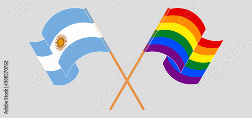 Crossed and waving flags of Argentina and LGBTQ