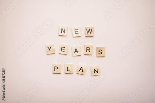The inscription new years plan from wooden blocks