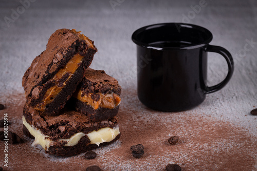 Chocolate brownie with delicious filling. Closeup photography.