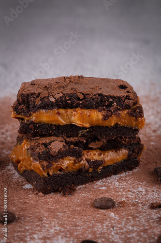Chocolate brownie with delicious dulce de letche filling. Closeup photography.