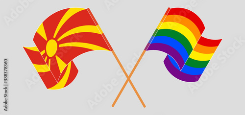 Crossed flags of LGBTQ and North Macedonia