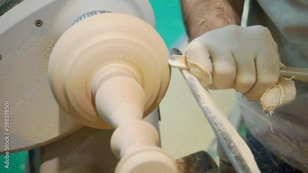 wood processing. production of a wooden detail on a lathe. close-up