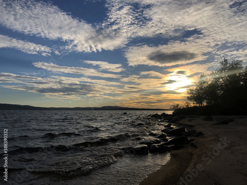 beautiful sunset in the North of Russia outside the city on the lake