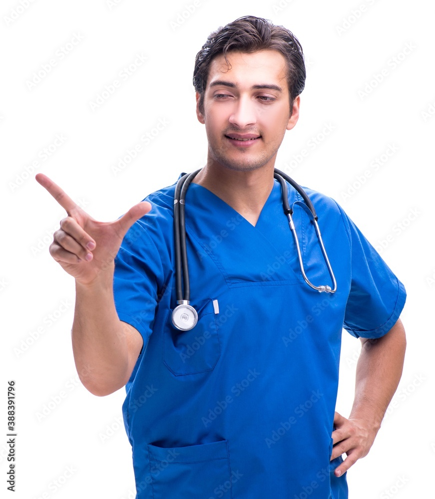 Young male doctor pressing buttons isolated on white Young male doctor pressing buttons isolated on white