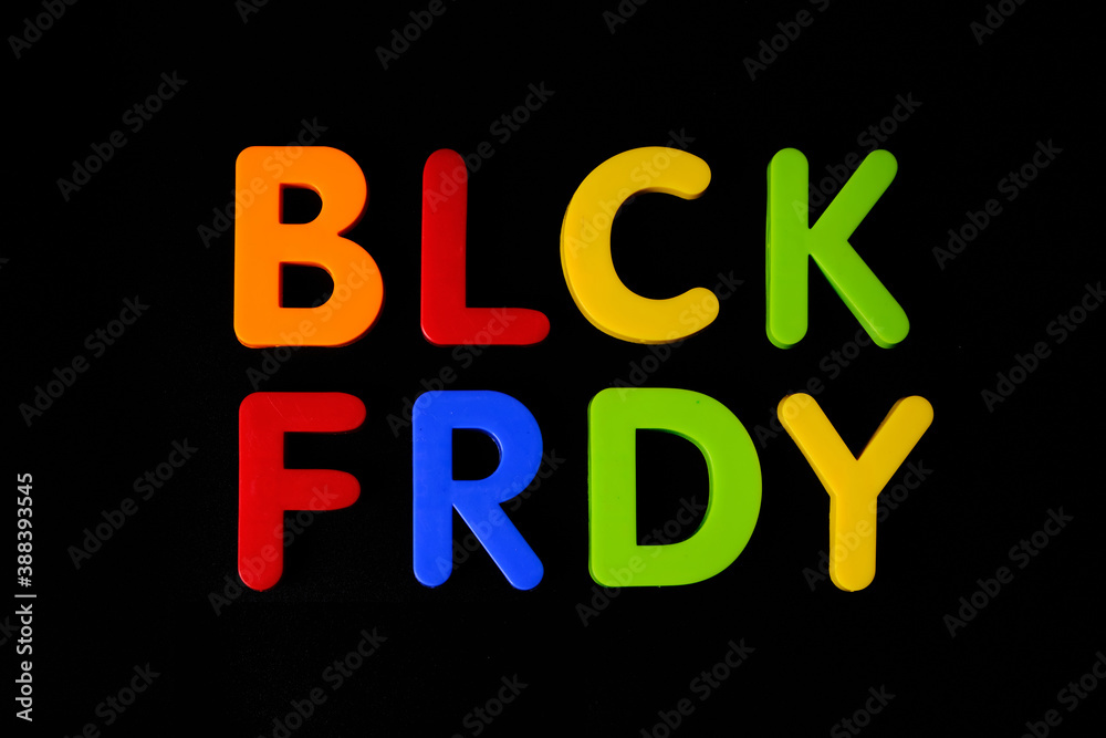 Black friday. Multi colored letters against black background Black friday. Multi colored letters against black background