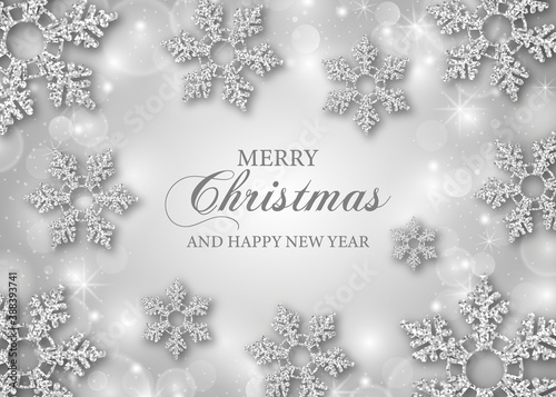 christmas greeting card with silver glitter snowflakes 