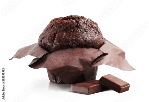 Chocolate muffin and chocolate bars isolated on a white background.