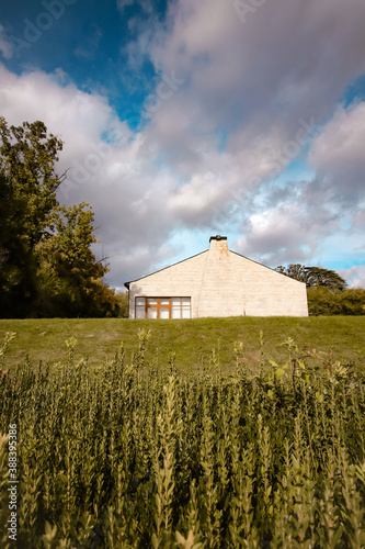 Modern home surrounded by vegetation in the countryside