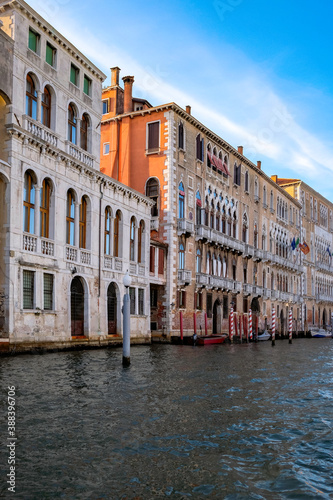 Beautiful Palace in Grand Canal on a Bright Cleer Day - Quiet Morning in Venice, Veneto, Italy. photo