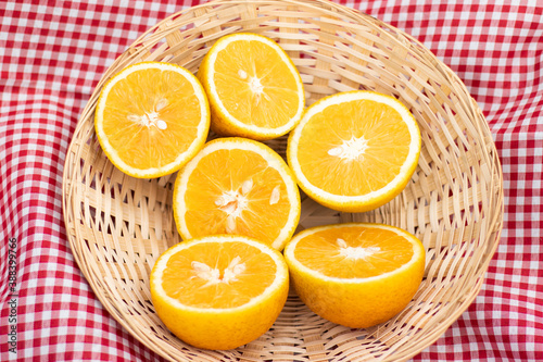 Background summer picnic with delicious oranges.