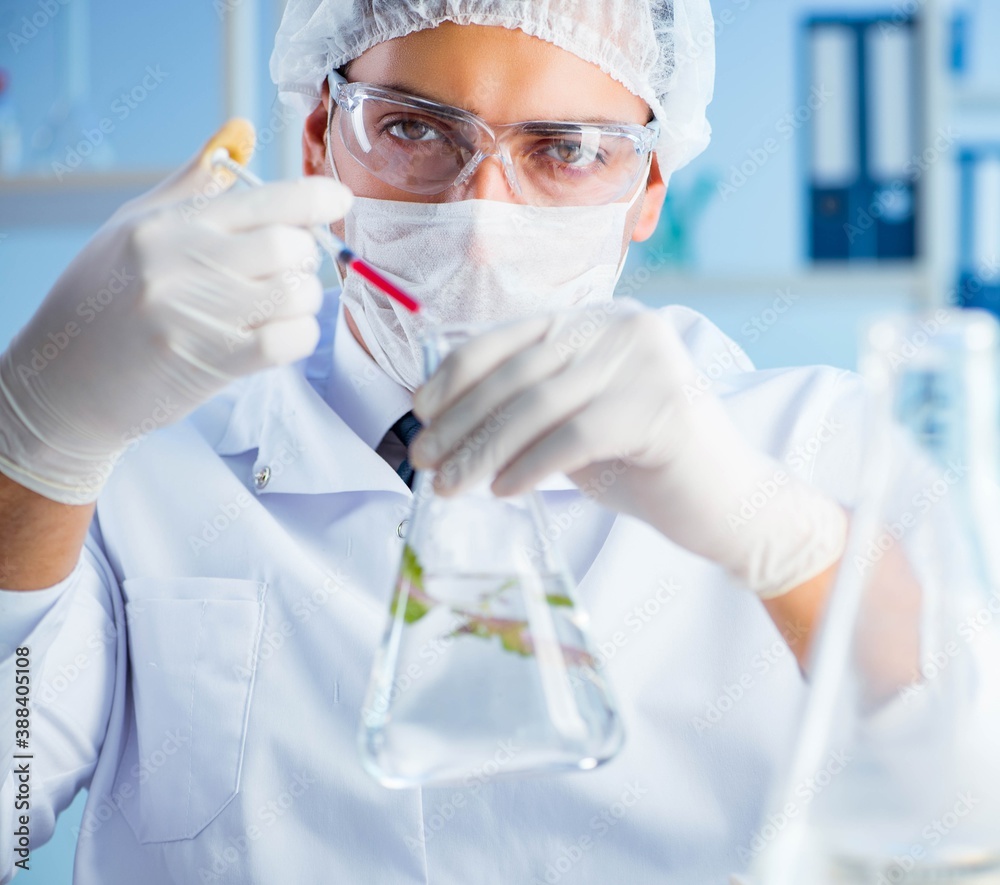 The biotechnology concept with scientist in lab The biotechnology concept with scientist in lab