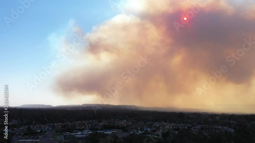 Aerial pan of California Wildfire Smoke Covering Middleclass Neighborhoods During the Silverado Fire_02