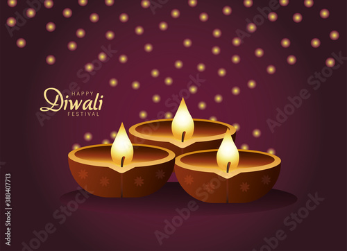 happy diwali celebration with three candles wooden and lights