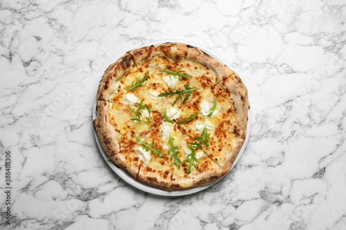 Tasty cheese pizza on white marble table, top view