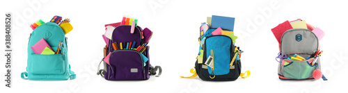 Set of backpacks with bright school stationery on white background, banner design photo
